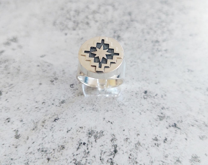 Chakana and Morning Star design ring, handmade in 950 silver with an aged background.