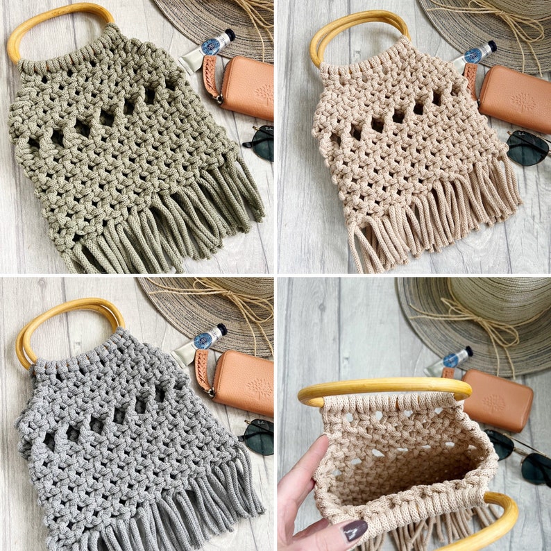 May include: Four crocheted bags with wooden handles and fringe. The bags are in different colours: green, beige, grey, and white. The bags are on a white wooden surface.