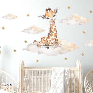 May include: A nursery room with a crib, rocking horse, and two wicker chairs. The wall has a decal of a giraffe sitting on a cloud with gold stars.
