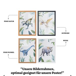 May include: Four different picture frames with a white background and a watercolor illustration of dinosaurs and tropical leaves. The frames are in natural wood, black, and white.