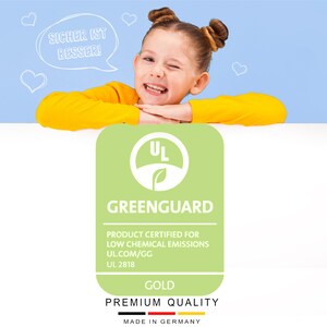 May include: A green and white GreenGuard certified product label with the text "UL" in a circle, "GREENGUARD", "PRODUCT CERTIFIED FOR LOW CHEMICAL EMISSIONS", "UL.COM/GG", "UL 2818", "GOLD", "PREMIUM QUALITY", and "MADE IN GERMANY".
