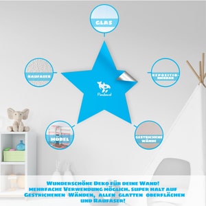 May include: A blue star with a white whale graphic and the word "Pandawal" inside. The star is surrounded by circles with text in German, including "Raufaser", "M&ouml;bel", "Glas", "Gestrischene W&auml;nde", and "Repositio-Nierbar". The text "WUNDERSCH&Ouml;NE DEKO F&Uuml;R DEINE WAND! MEHRFACHE VERWENDUNG M&Ouml;GLICH. SUPER HALT AUF GESTRICHENEN W&Auml;NDEN, ALLEN GLATTEN OBERFL&Auml;CHEN UND RAUFASER!" is at the bottom of the image.
