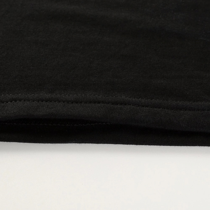 Bodycon short sleeve cotton mini dress with cutout detail in black