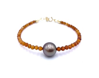 Orange Hessonite bracelet with a Tahitian cultured pearl