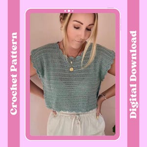 May include: A light teal crochet top with a scalloped neckline and sleeves. The words "Crochet Pattern" and "Digital Download" are printed on the left and right sides of the image, respectively. The top is paired with light-colored pants.