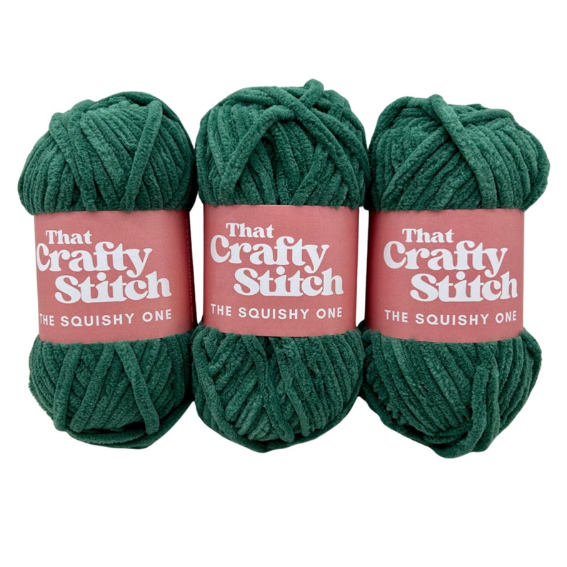 May include: Three skeins of green yarn labeled "That Crafty Stitch The Squishy One".