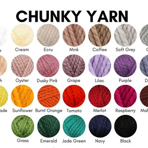 May include: A color chart of chunky yarn in 20 different colors. The colors are arranged in rows and labeled with their names. The colors include white, cream, ecru, mink, coffee, soft grey, grey, peach, oyster, dusky pink, grape, lilac, purple, denim, lemonade, sunflower, burnt orange, tomato, merlot, raspberry, mahogany, grass, emerald, jade green, navy, and black.