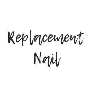 May include: Handwritten text that reads "Replacement Nail".