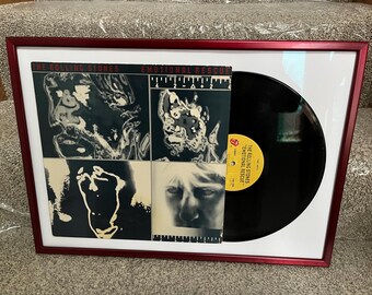 Emotional Rescue by The Rolling Stones Vinyl Album in a Glass Frame