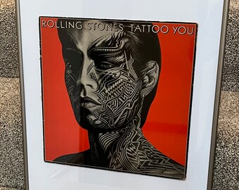 Tattoo You by The Rolling Stones Vinyl Album in a Glass Frame
