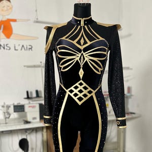 Black and gold Velvet warrior style leotard with rhinestones for aerial performance