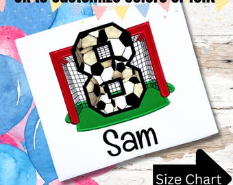 May include: An embroidered design featuring the number 8 constructed from black and white football patterns positioned in front of a red football goal on a green field with the name Sam below and the text ok to customise colours or font.