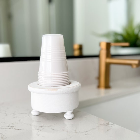 Bathroom cup dispenser discount