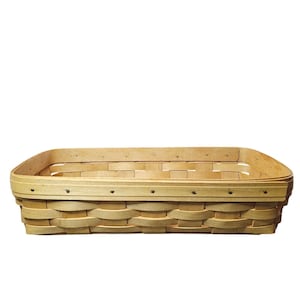May include: A rectangular woven basket with a light brown color. The basket has a rounded rim and is constructed with interwoven strips of wood. Small metal rivets secure the rim.