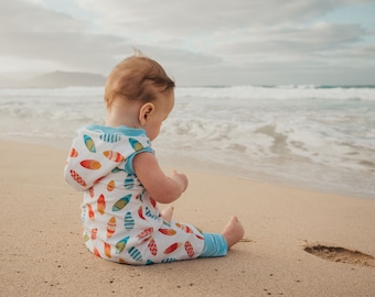 Hooded romper with a fun island vibe in adorable surfboard and wave print for your little boy or girl - available with sleeves or sleeveless