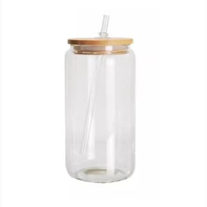 May include: A clear glass tumbler with a bamboo lid and a clear straw. The tumbler is cylindrical. The bamboo lid has a hole for the straw. The straw is straight and clear. The tumbler is suitable for cold drinks.
