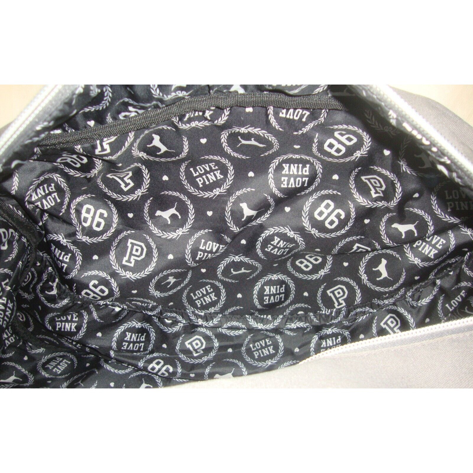 Victoria's secret pink duffle bag with wheels hotsell