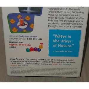 May include: The rear of a Baby Neptune DVD case shows a cartoon hippo in a life preserver with yellow ducks. Text includes "Water is the driver of Nature" and "Approx. 30 minutes" of content.