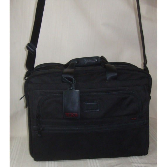 Black Nylon Tumi Tote Bag Carry-On Shoulder Purse Pockets Red