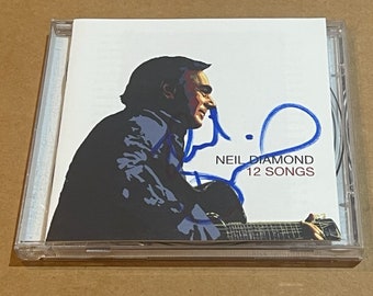 NEIL DIAMOND Firmado Autografiado 12 Canciones CD Libreto