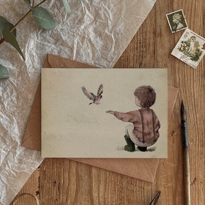 Biglietto d'auguri ecologico con finitura vintage per nutrire gli uccelli