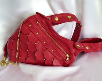 small handbag for women, made of red lambskin, with leather circles and rivets in the 70th's style Shoulder bag "Vampira" Revolverbag