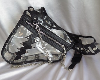 transparent shoulder bag in revolver bag style "got the look", for women, with black leather edging, rivets and zipper