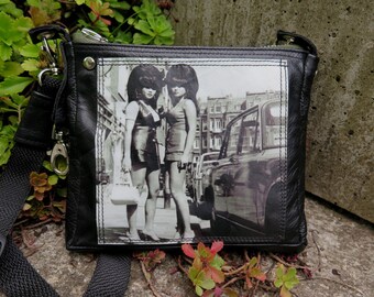 small crossbody for women, ideal for cyclists, made of black leather, with vintage image and shoulder strap