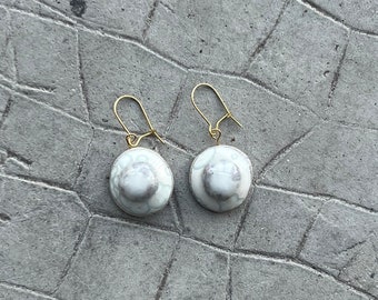 Boucle d’oreille tété
