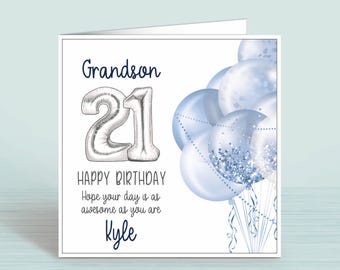 May include: A white birthday card for a grandson, featuring the word "Grandson" and the number "21" in silver. The card includes the text "Happy Birthday" and "Hope your day is as awesome as you are Kyle", with blue balloons.