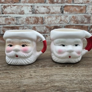 Set of two vintage Santa mugs