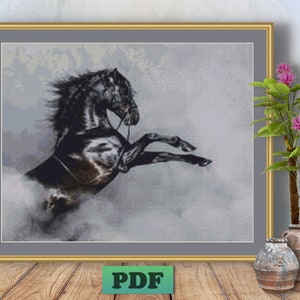 May include: A black horse with a flowing mane leaps into the air, its hooves barely touching the ground. The horse is silhouetted against a light gray background, creating a dramatic and powerful image.