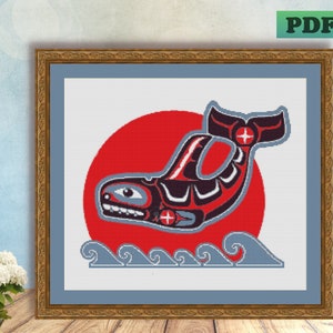 May include: Cross-stitch pattern featuring a stylised red, black and white orca whale swimming in blue waves against a red sun.