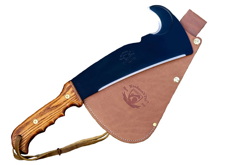 May include: A black and brown wood-handled machete with a curved blade and a leather sheath. The sheath has the text "Woodman's Pal" and "Est. 1911" embossed on it.