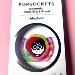 Disney Coco inspired MagSafe Popsocket phone grip.
