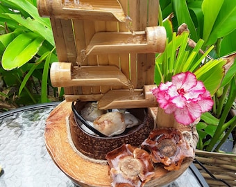 Mini fountain from Bamboo & coconut shell.