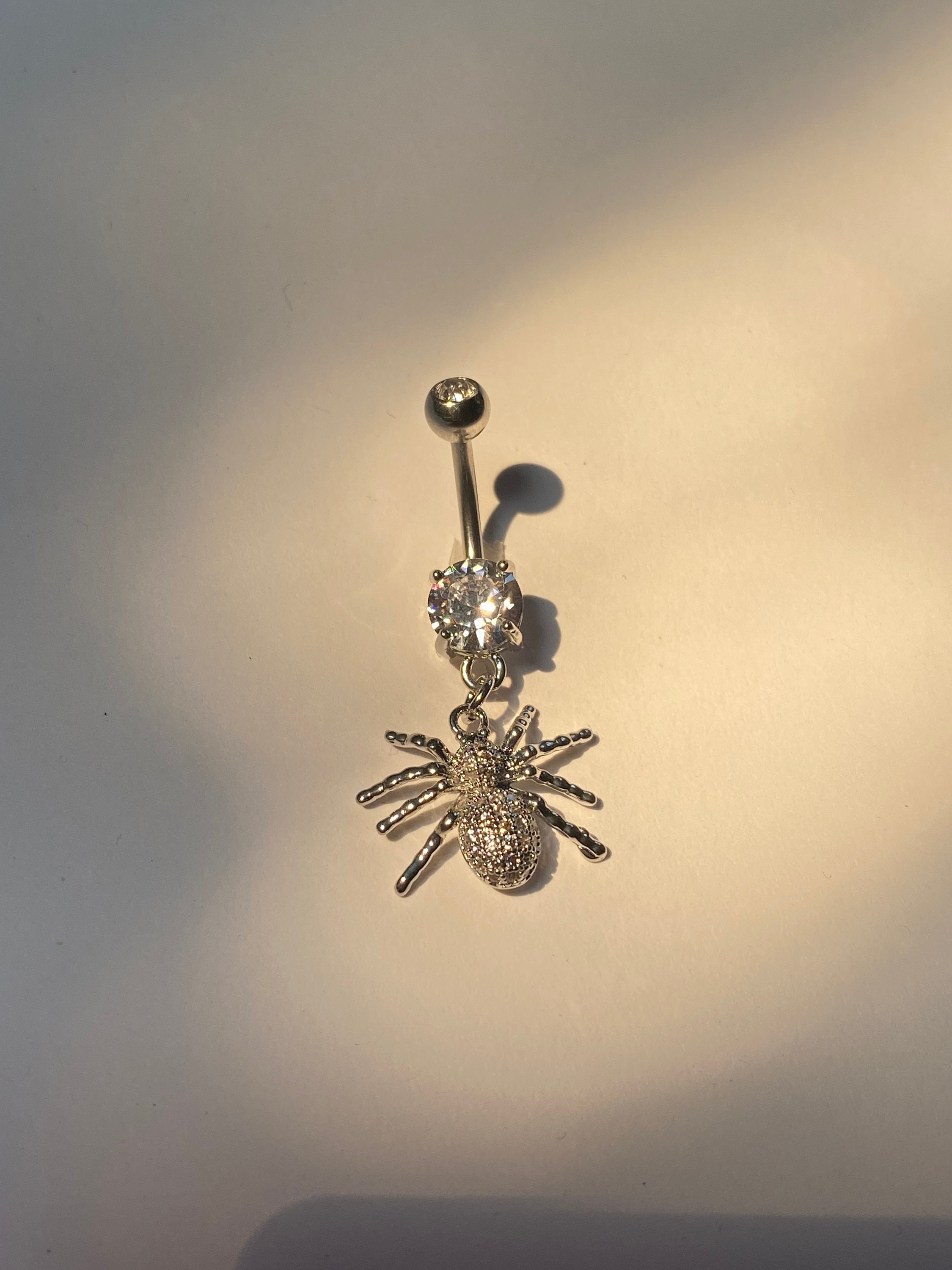 Spider belly shop button ring