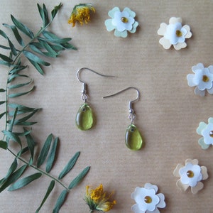 Brincos de vidro verde