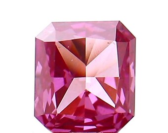 May include: A pink square-shaped gemstone with a faceted cut.