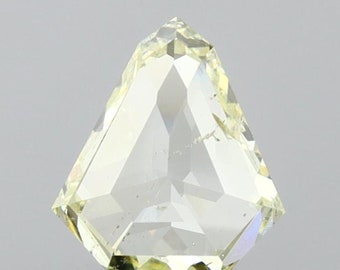 0.89 CT Shield Cut Natural Fancy Yellow Diamond, SI2 Clarity