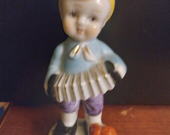Vintage Accordian boy Figurine