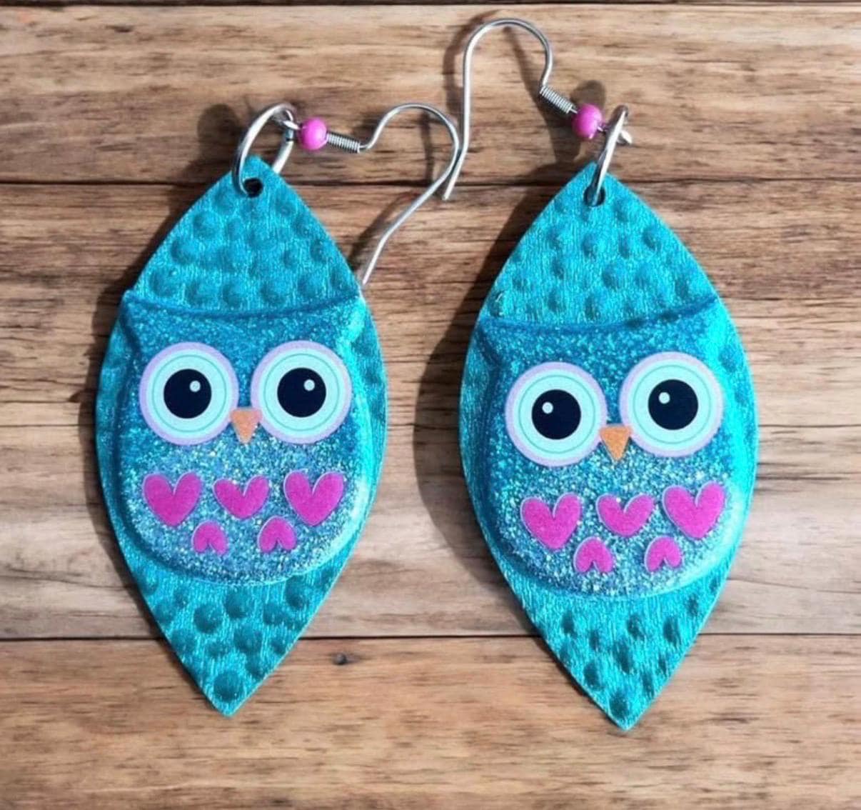 Dot-painted owl turquoise pink 2&rdquo; oval earrings puffy 3D football-shaped