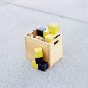 Kubb Game w/ Natural Box (Black & Yellow)