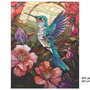 May include: A 252-piece jigsaw puzzle featuring a vibrant hummingbird with turquoise and purple feathers, surrounded by pink and red flowers. The puzzle measures 10" x 14".
