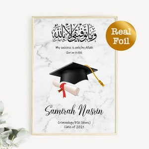May include: A white marble background with a black graduation cap and diploma. The text "My success is only by Allah Qur'an 11:88" is written in Arabic. The name "Samirah Nasrin" is written in black cursive font. The text "Criminology BSc (Hons) Class of 2021" is written in black font. A gold foil sticker with the text "Real Foil" is in the upper right corner.