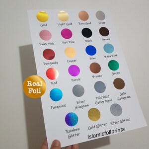 May include: A chart of different colored foil sheets, including gold, silver, red, blue, green, purple, and black. The chart also includes holographic and glitter foil options. The text "Real Foil" and "Islamicfoilprints" are visible on the chart.