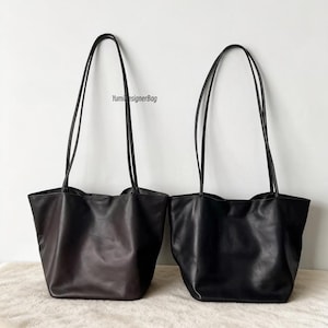 Könnte beinhalten: Ein Satz von drei Keramik-Nisttöpfen in abgestuften Größen. Die Schalen sind weiß mit einer gesprenkelten, strukturierten Oberfläche und haben einen leicht ausgestellten Rand. Ideal für die Zubereitung oder das Servieren von Speisen.