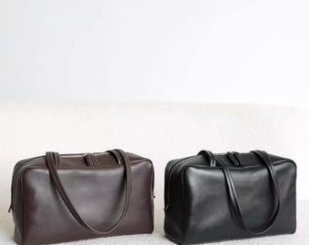 Borsa tote in pelle di montone di alta qualità, borsa a mano da donna, borsa a tracolla in pelle di agnello dal design minimalista, borsa da bowling