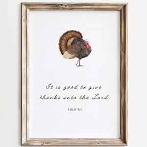 May include: A framed print with a watercolor illustration of a turkey and the text "It is good to give thanks unto the Lord. Psalm 92:1".