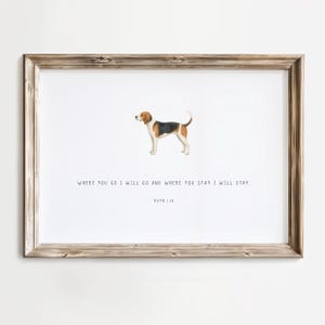 May include: A framed print featuring a watercolor illustration of a beagle dog. The dog is brown, black, and white. The text reads: "WHERE YOU GO I WILL GO AND WHERE YOU STAY I WILL STAY. RUTH 1:16."